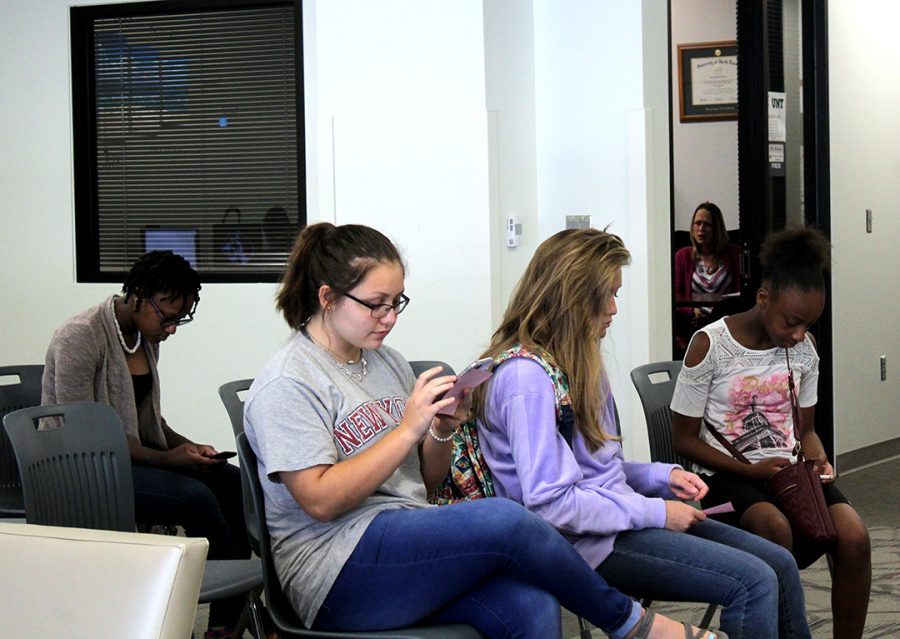 Students sit in the counseling office as they wait to be called to discuss their schedules in early September. According to counselors, 519 students requested schedule changes this year.