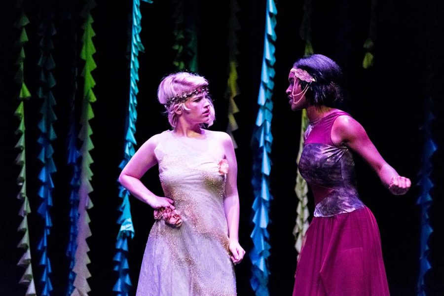 Ariel Tacia, left, plays a fairy who conspires with the mischievous Puck, played by Savanah Downing, in A Midsummer Nights Dream.