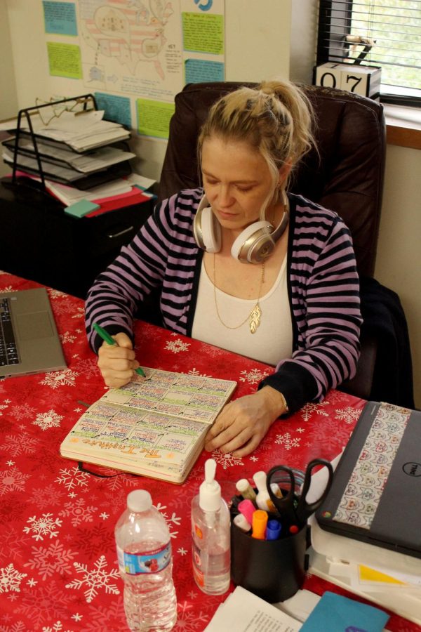 English teacher Sara Zimmerman works on lesson plans for the week in her classroom at Braswell High School on Dec. 7, 2017. Zimmerman is currently in the process of publishing two books: "Vegas Girl" and "Cliff Jumpers."