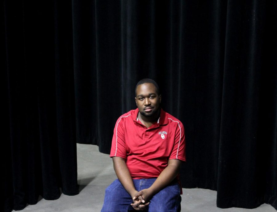 Technical theatre teacher Taylor Daniels poses for a portrait in the BHS auditorium. This is Daniels first year at Braswell, and he said he is enjoying the experience.  “I think that we have a really good season, we have really awesome kids and a really incredible program,” he said.
